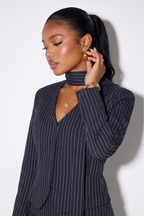 Vivian tailored pinstripe blazer and mini skirt set, another view of the tailored two-piece set.