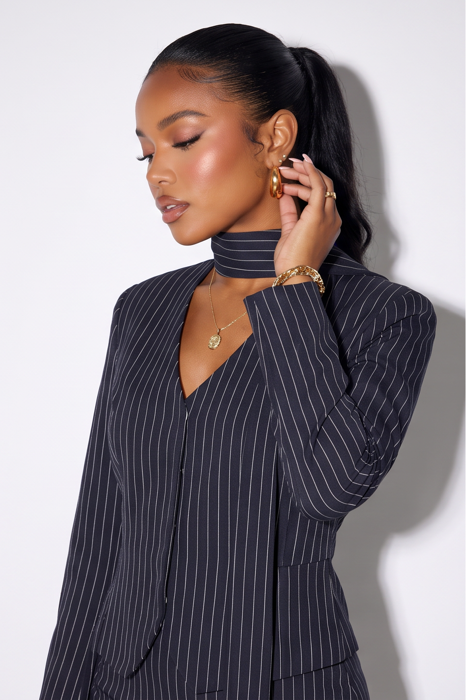 Vivian tailored pinstripe blazer and mini skirt set, another view of the tailored two-piece set.