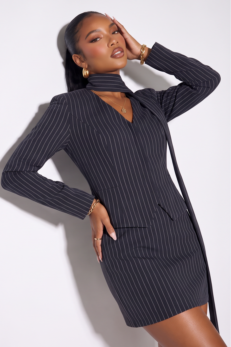 Vivian tailored pinstripe blazer and mini skirt set, alternate angle highlighting the blazer and mini skirt.