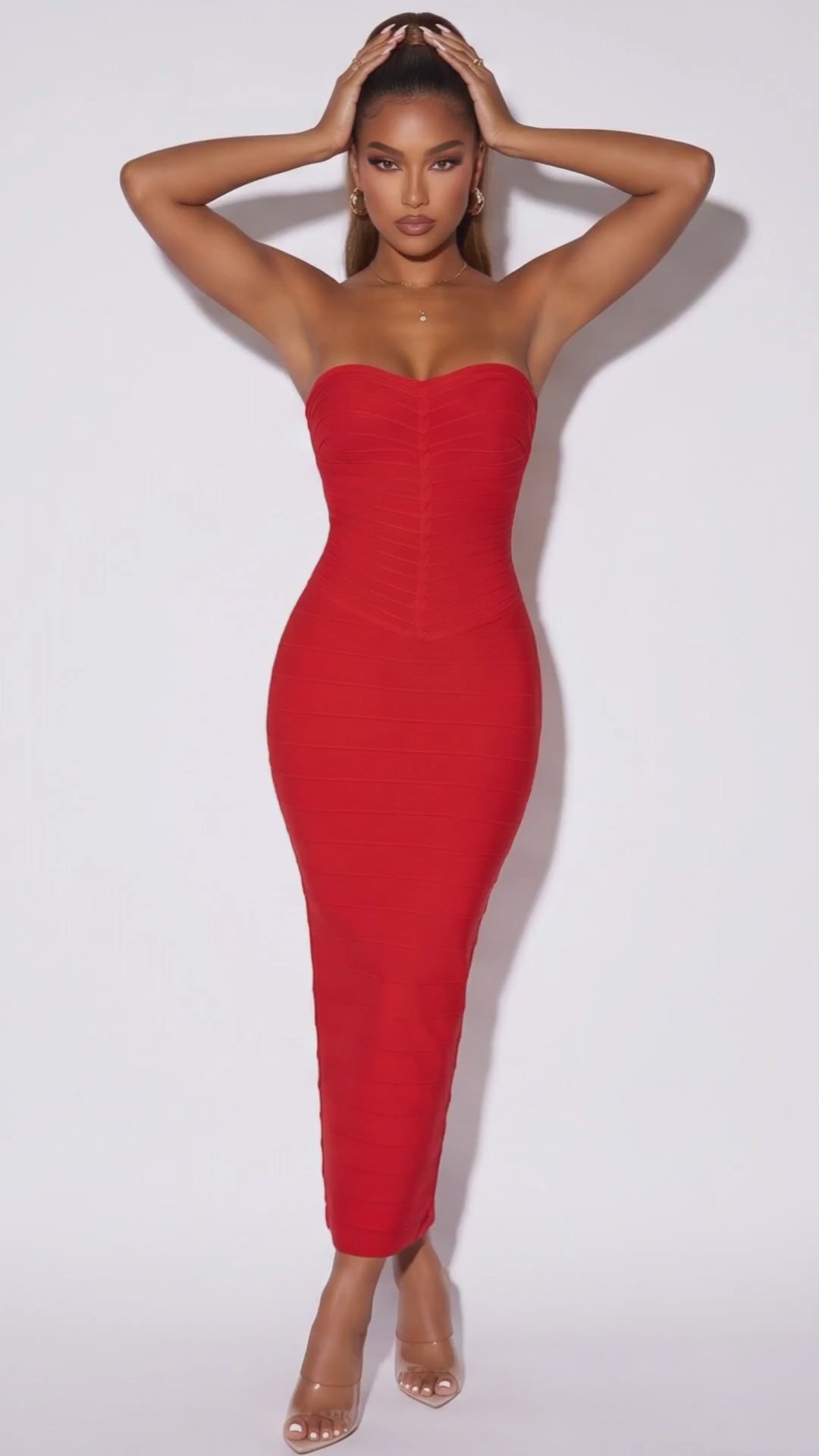 Demi Chevron Detail Strapless Bandage Maxi Dress in Red – product video, model wearing strapless bandage maxi dress, white studio background – LuckyRbls